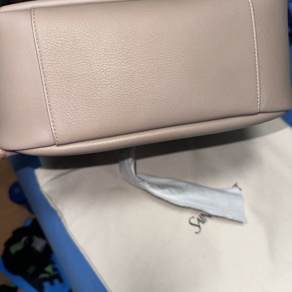 Authentic Saint Laurent le 5 A 7 supple large in grained leather - Picture 10 of 13